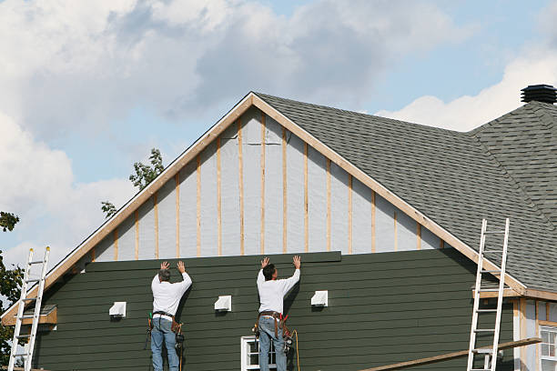 Professional Storm Damage Siding Repair technician working in Verona, PA